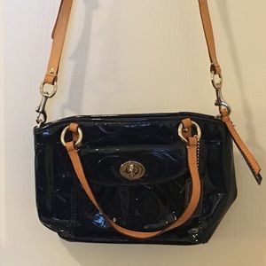 Gently used blue Coach crossbody handbag